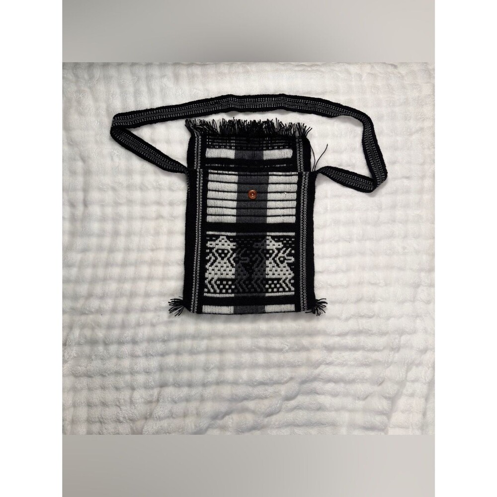 Woman’s Black and White Woven Crossbody Bag with Geometric Motif